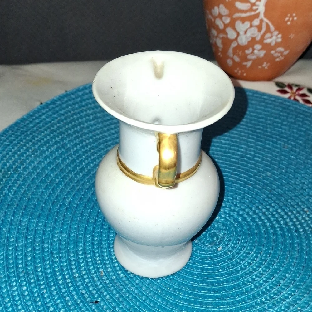 Elegant White Vase with Gold Accents